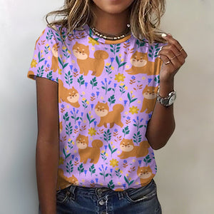 image of a woman wearing a lavender shiba inu all over print t-shirt
