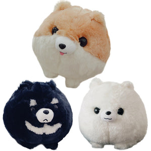 Image of three adorable stuffed Dog plush toy pillows looking up on which background