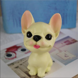 Image of a french bulldog bobblehead in the color tan / cream