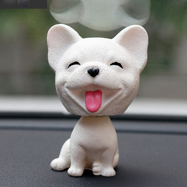 Image of a smiling french bulldog bobblehead made of plastic