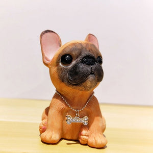 Image of a sitting french bulldog figurine in the color tan