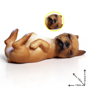 Image of a miniature sleeping on back french bulldog figurine in the color fawn/tan