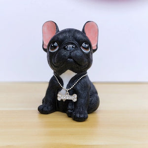 Image of a sitting french bulldog figurine in the color black