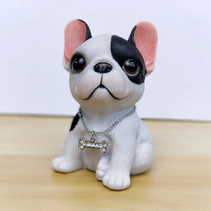 Image of a sitting one patch french bulldog figurine in the color pied black and white