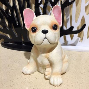 Image of a french bulldog figurine in the color white / cream made of resin