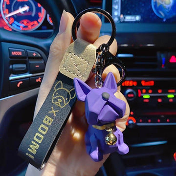 Image of an abstract frenchie keychain in the color purple