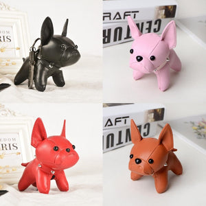 Image of the collage of four frenchie keychains in different colors made of PU leather
