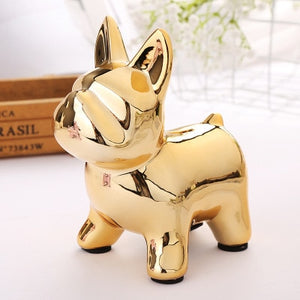 Image of a french bulldog piggy bank in the color gold