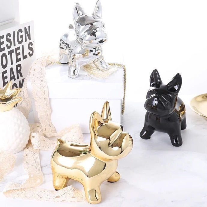 Image of three french bulldog piggy banks in the color black, silver and gold