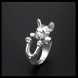 Image of a french bulldog ring in the cutest hanging Frenchie design