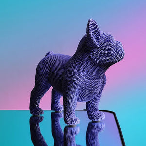Image of a textured french bulldog statue in the color purple