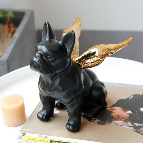 Image of a black french bulldog statue with Golden Angel Wings, made of black ceramic, with gold-plated angel wings