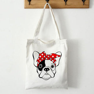 Image of a french bulldog tote bag in pied black and white frenchie with red headscarf