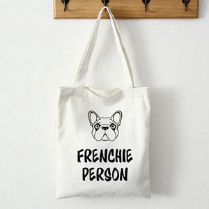 Image of a french bulldog tote bag in frenchie person black and white design