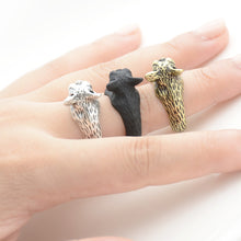 Load image into Gallery viewer, Image of three french bulldog wrap rings on the finger of a person in three colors including Antique Silver, Bronze, and Black Gunmetal