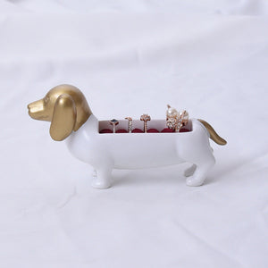 Side image of a beautiful white and gold colored Dachshund jewelry box