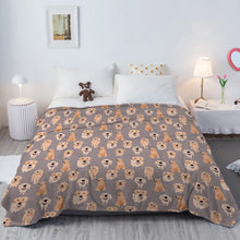 Load image into Gallery viewer, Image of a Golden Retriever blanket in an infinite smiling Golden Retrievers design kept on the bed