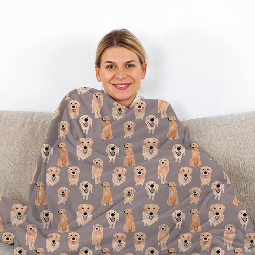 Image of a smiling lady covered herself with a Golden Retriever blanket in an infinite smiling Golden Retrievers design