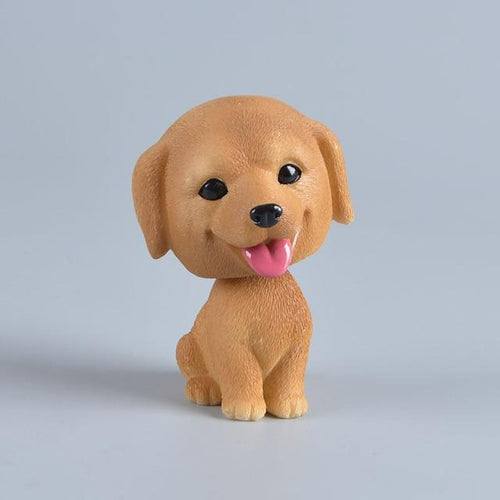 Image of a smiling Golden Retriever bobblehead made of resin