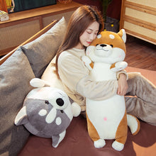 Load image into Gallery viewer, image of a woman hugging a shiba inu stuffed animal plush toy pillow