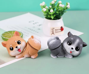 Image of a Shiba Inu and Husky bobblehead in the cutest bobble-butt design