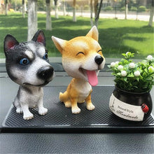 Load image into Gallery viewer, Image of husky bobblehead on the car dashboard
