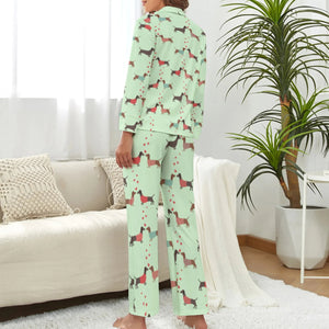 image of a woman wearing a green pajamas set for women - pink pajamas set for women - dachshund pajamas set - back view