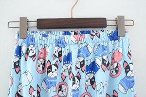 Image of boston terrier pajama pants hung on a hanger