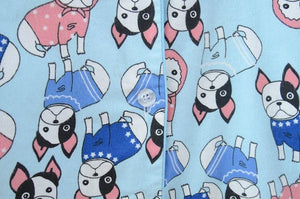 Close up image of boston terrier pajamas buttons
