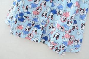 Close up image of boston terrier print pajamas