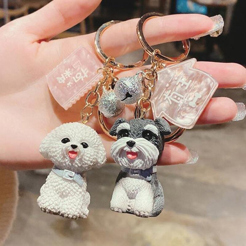 Image of two super-cute Bichon Frise and Schnauzer keychains in 3D designs