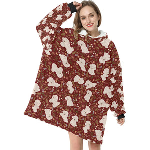 image of a woman wearing a bichon frise blanket hoodie for women - maroon
