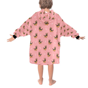 Image of a kid wearing a German shepherd blanket hoodie in pink color with a white background - back view