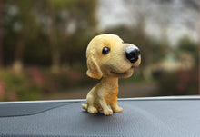 Load image into Gallery viewer, Image of a labrador car bobblehead in a car