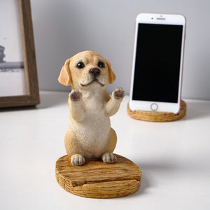 Image of a super cute yellow labrador phone holder made of resin
