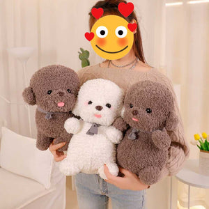 Image of a lady holding three Bichon Frise Stuffed Animals