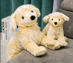 image of adorable golden retriever stuffed animals in different sizes playing with each other