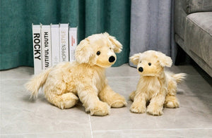 image of adorable golden retriever stuffed animals in different sizes playing with each other