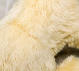 image of an adorable golden retriever stuffed animal fur close up