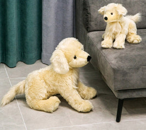 image of adorable golden retriever stuffed animals in different sizes playing with each other