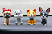 Load image into Gallery viewer, Image of four nodding bobbleheads on a car dashboard shaped like a girl Pug, Miniature Schnauzer, Corgi, and Boston Terrier