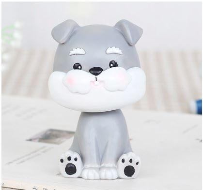 Image of a nodding Miniature Schnauzer bobblehead made of Resin