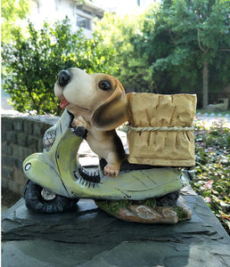 Image of a super cute outdoor beagle statue in the cutest Beagle riding a scooter with a delivery basket design