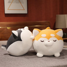 Load image into Gallery viewer, Image of two Shiba Inu stuffed animal plush toy pillows on a bed