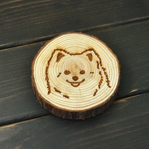 Image of an engraved Pomeranian coaster made of wood