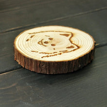 Load image into Gallery viewer, Side image of a wood-engraved Pomeranian coaster design
