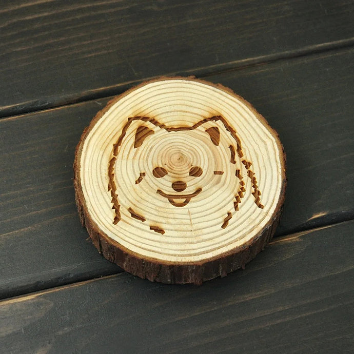 Image of a wood-engraved Pomeranian coaster