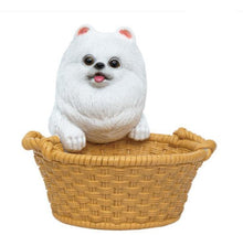 Load image into Gallery viewer, Image of a super cute Pomeranian statue in the most helpful Pomeranian holding a basket design