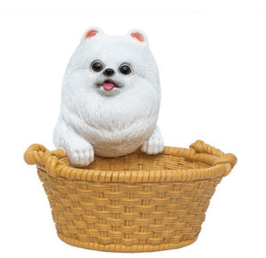 Image of a super cute Pomeranian statue in the most helpful Pomeranian holding a basket design