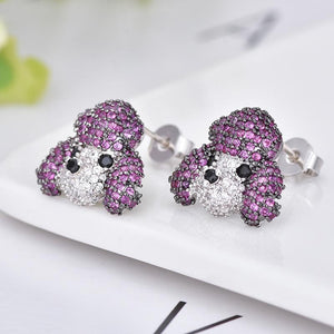 Image of a pair of poodle earrings in super cute studded poodle loving design